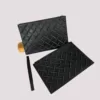 Bottega Brick Clutch in Black