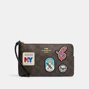Coach Large Corner Zip Wristlet In Signature Canvas With Ski Patches Brown Black Multi