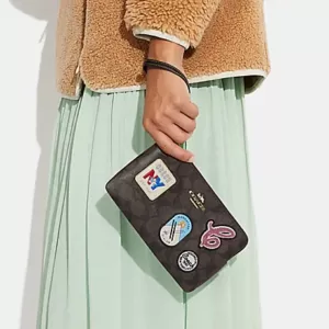 Coach Large Corner Zip Wristlet In Signature Canvas With Ski Patches Brown Black Multi