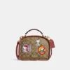 Coach X Peanuts Lunch Pail In Signature Canvas With Patches Khaki Redwood Multi