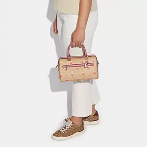tas jinjing wanita Coach Rowan Satchel In Signature Canvas With Stripe Heart Print Light Khaki Multi