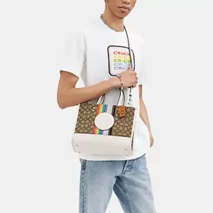 Coach Dempsey Carryall In Signature Jacquard With Rainbow Stripe And Coach Patch Chalk Multi